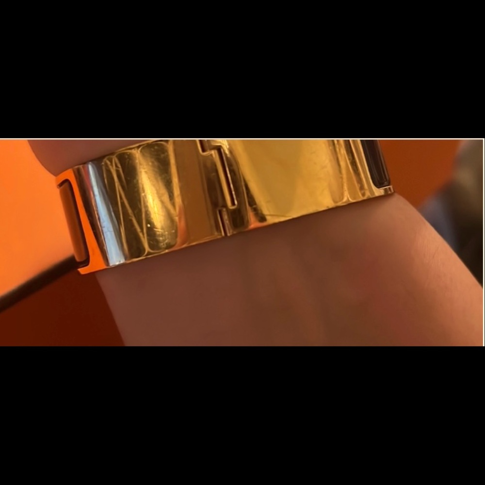 Hermes black and gold bracket .
